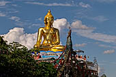 Buddha statue in the small village of Sop Ruak, on the Thai shore of the Mekong, Northern Thailand. 